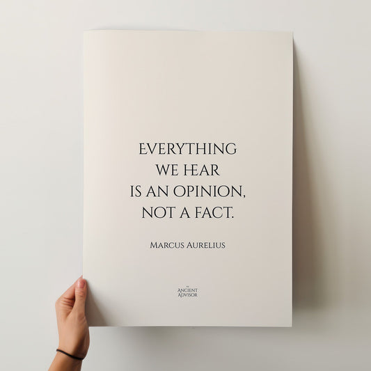 Poster with a quote by Marcus Aurelius held by a hand on a light background